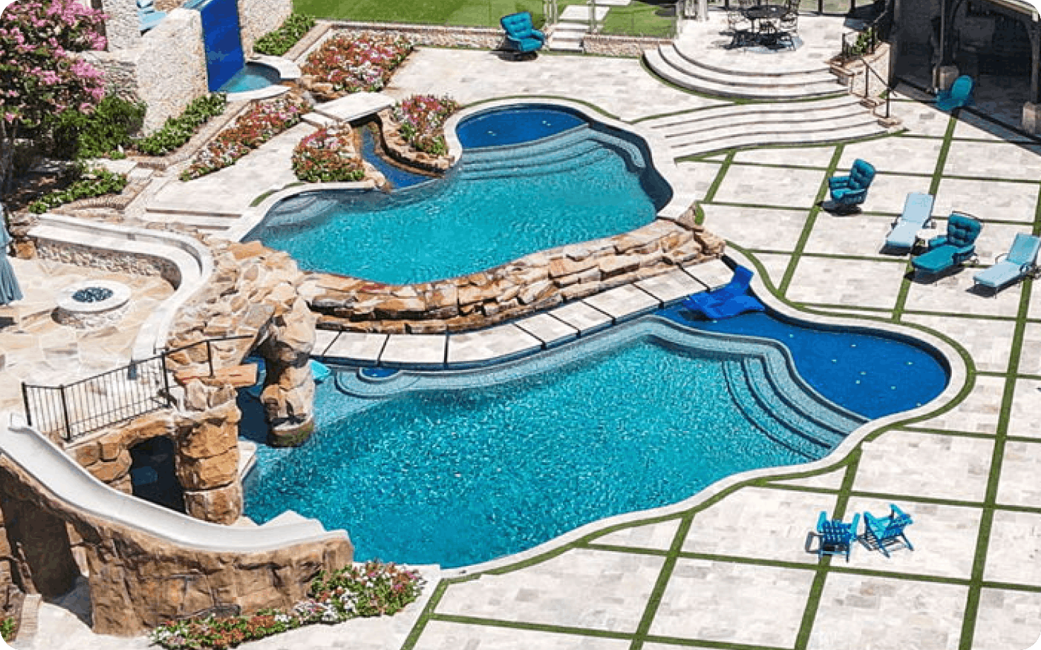 Natural freeform swimming pool with rock waterfall feature in Fort Worth